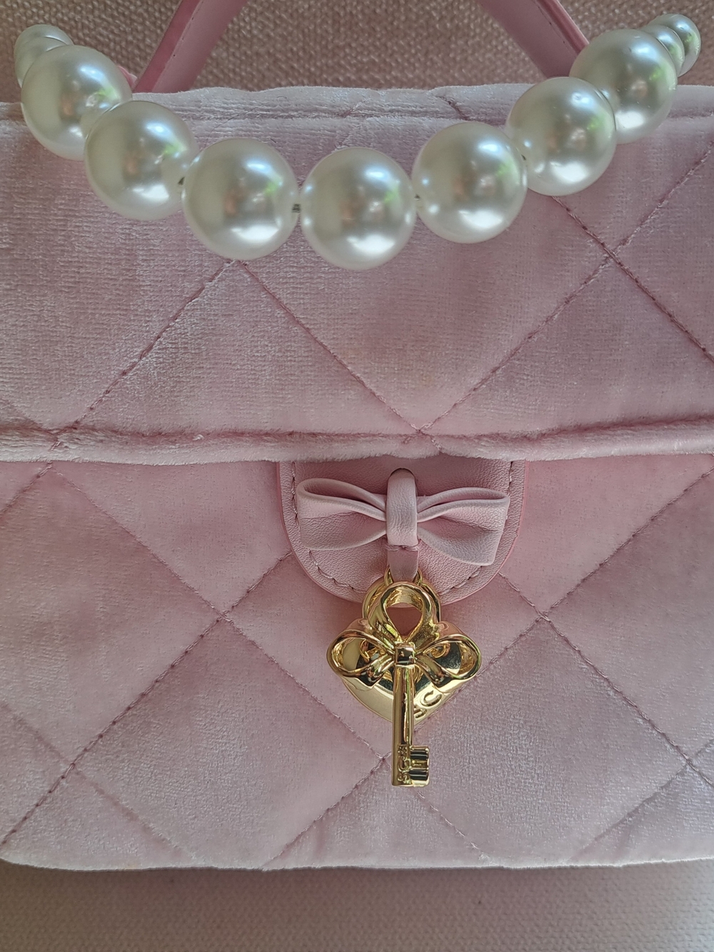 Pink Velvet Quilted Top-Handle Bag with Pearl Accent